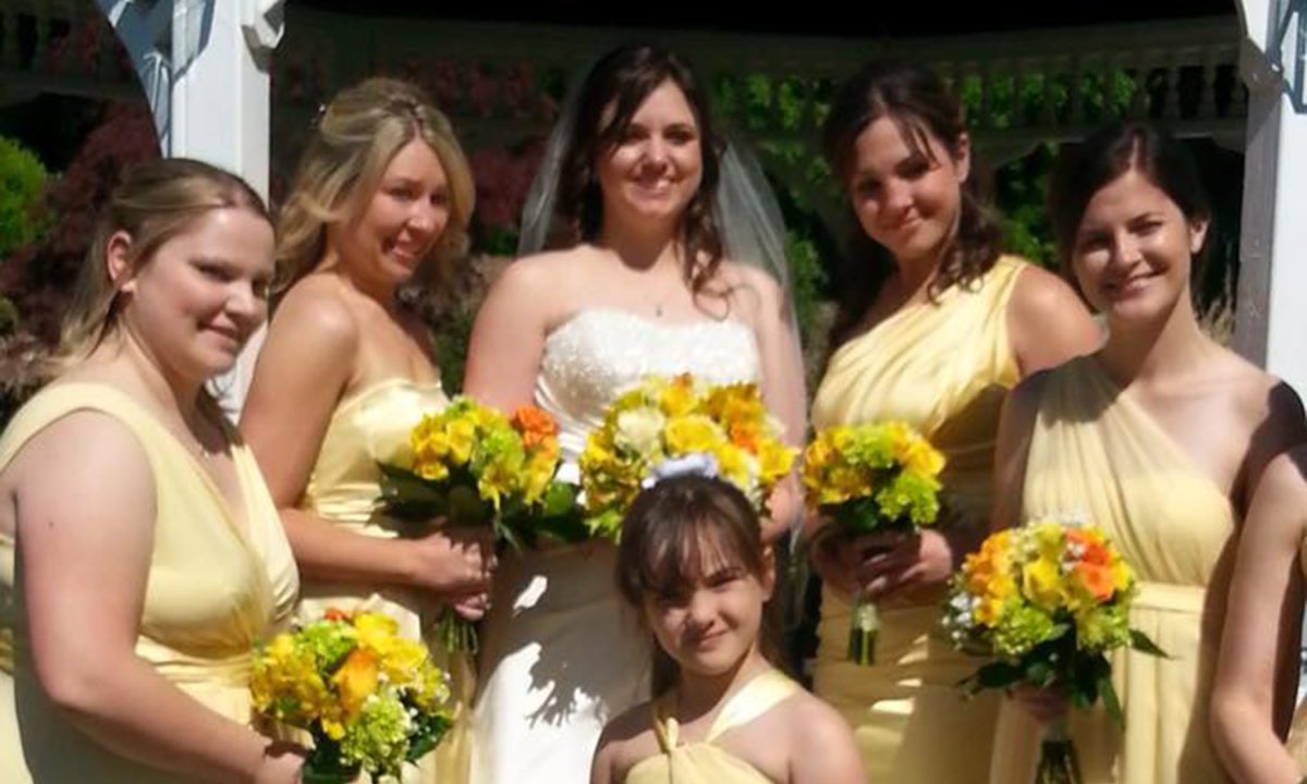 tent-wedding-bride-bridesmaids-in-front-of-gazebo