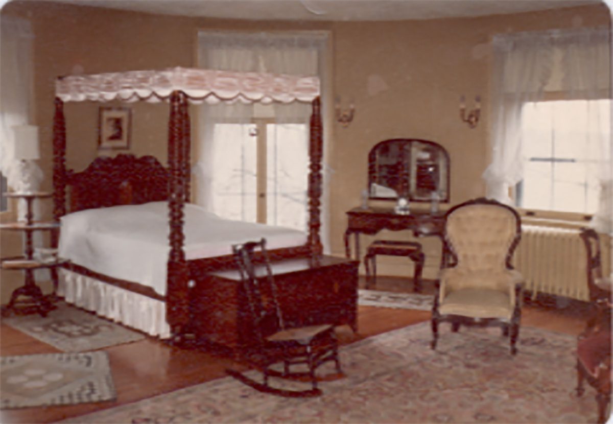 castle-bedroom-with-canopy-bed-french-doors