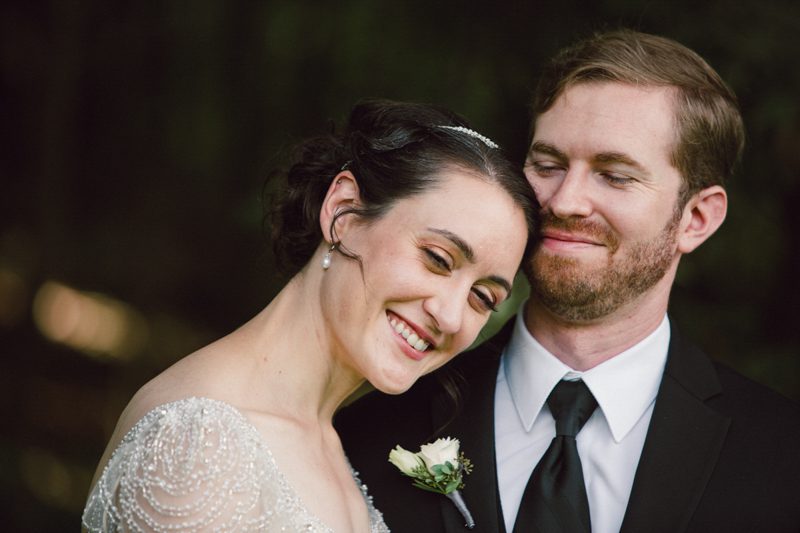 art-deco-wedding-bride-leaning-her-head-against-grooms-cheek- both-smiling