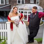 mandy and scott posing in front of the conservatory