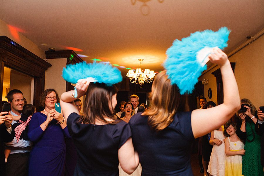 guests-dancing-with-blue-fans