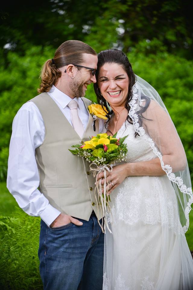 may wedding couple standing close