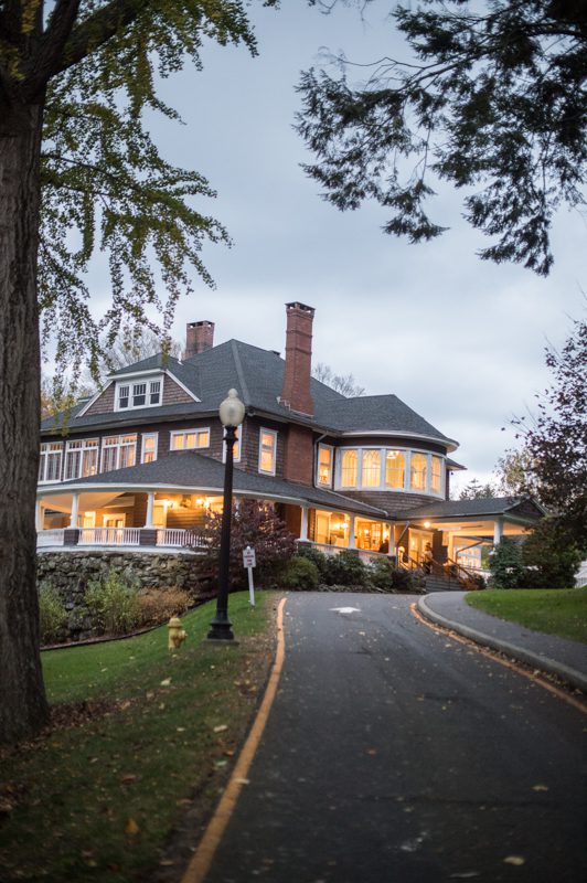 photo of the mansion lit up at dusk