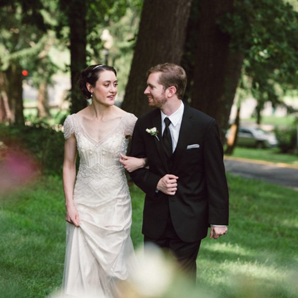 art deco couple walking arm in arm