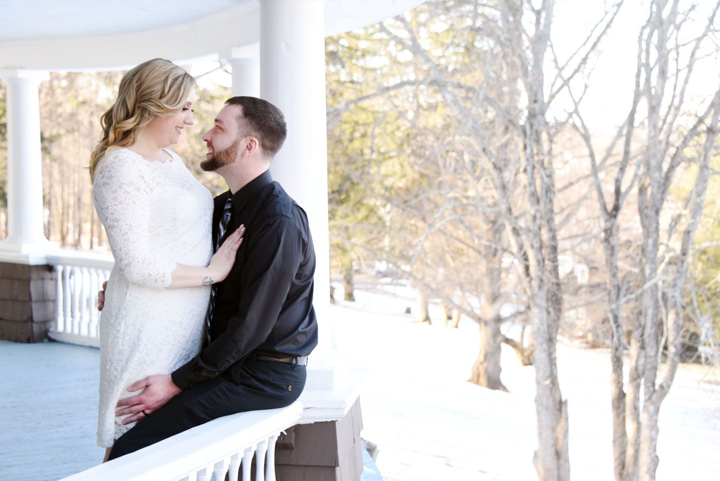 valentine-wedding-ceremony-couple-holding-each-other-on-veranda