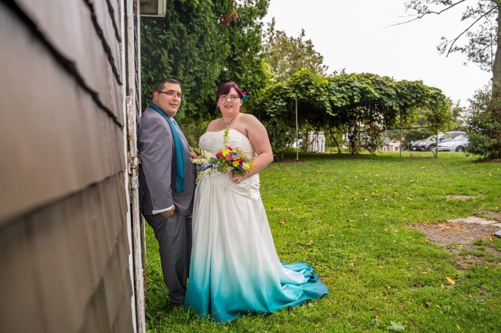 weekday-wedding-couple-standing-near-icehoust