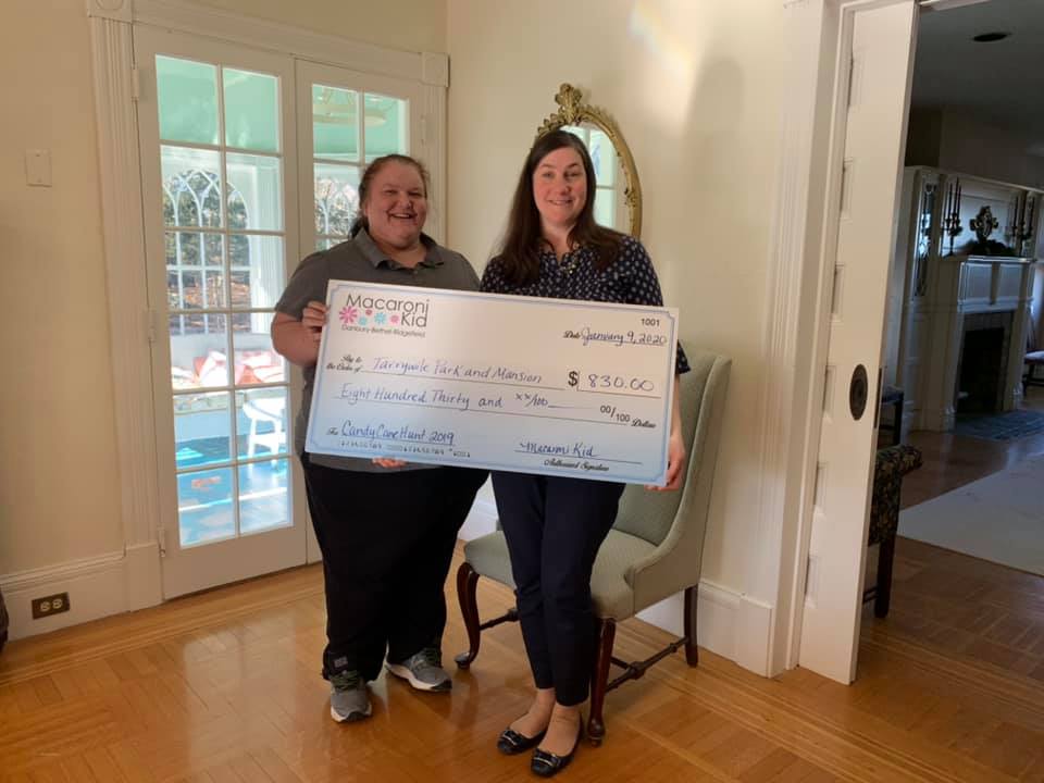 meghan presenting big check to becky