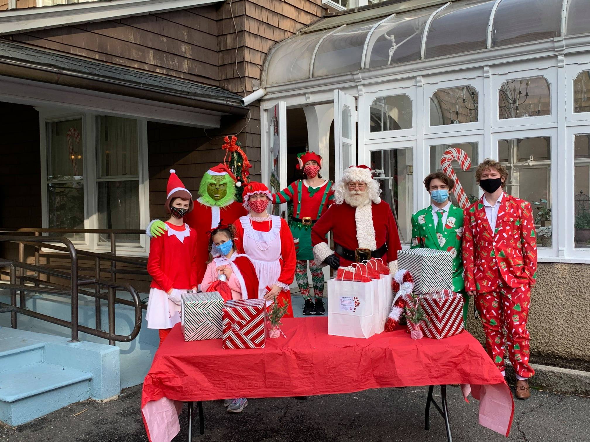 volunteers together dressed in holiday costumes